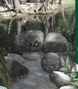 Remoção de pichação na pedra do lago do Campo de São Bento
